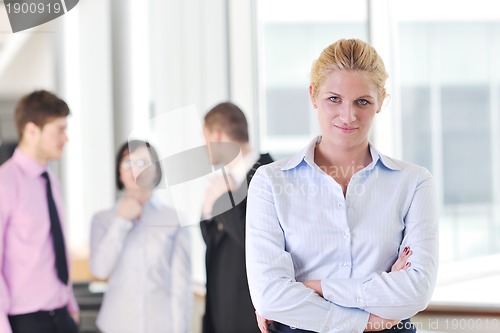 Image of young business woman on meeting