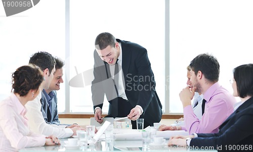 Image of group of business people at meeting