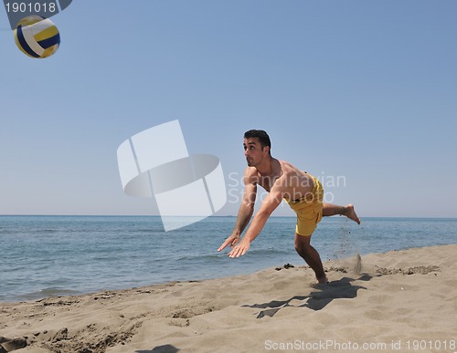 Image of male beach volleyball game player