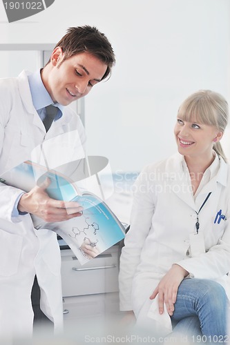 Image of science people in bright lab