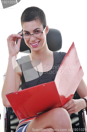 Image of brunette female  model posing on business chair