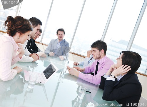 Image of group of business people at meeting