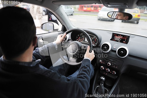 Image of man using car navigation