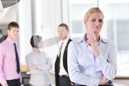 Image of young business woman on meeting