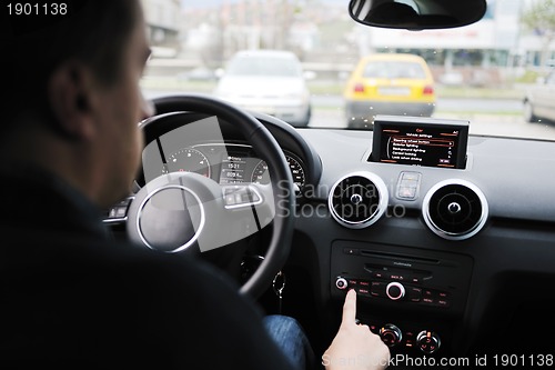 Image of man using car navigation