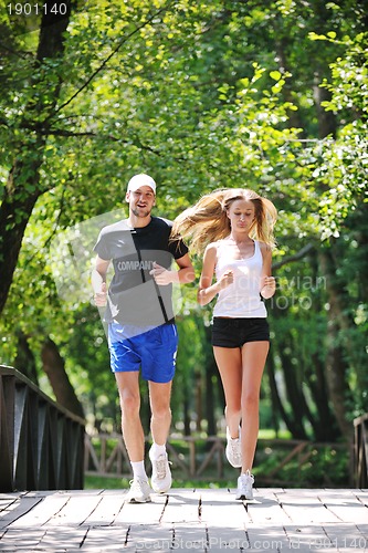 Image of couple jogging outdoor