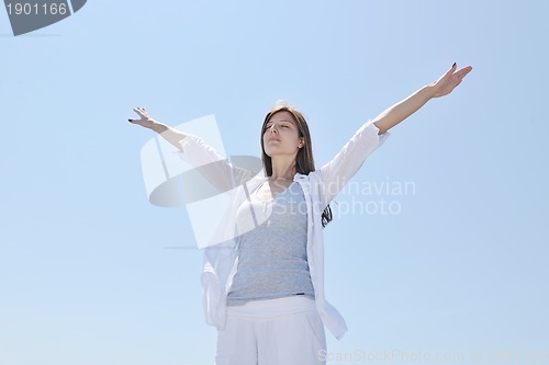 Image of young woman relax  on beach