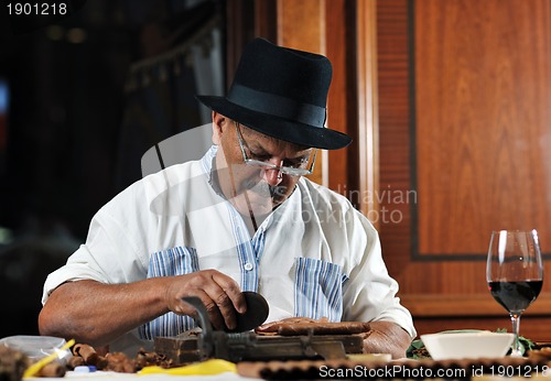 Image of man making luxury handmade cuban cigare