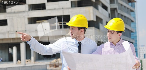 Image of Team of architects on construciton site