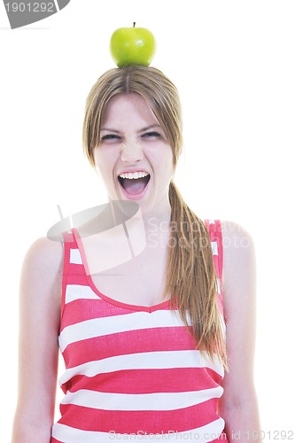 Image of happy  young  woman eat apple isolated  on white