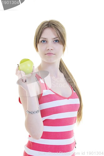 Image of happy  young  woman eat green apple isolated  on white