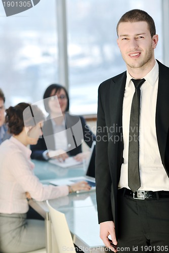 Image of group of business people at meeting