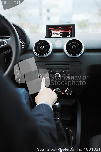 Image of man using car navigation