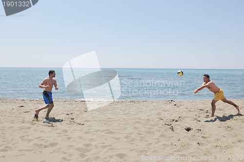 Image of male beach volleyball game player