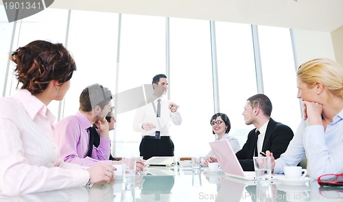 Image of group of business people at meeting