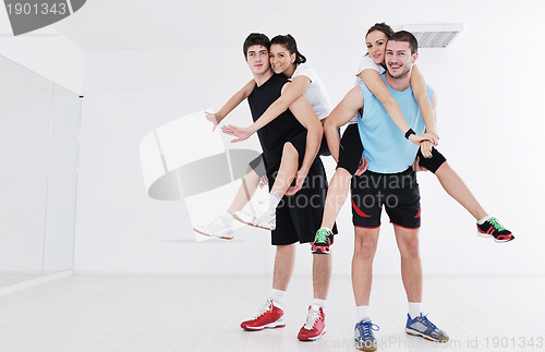 Image of young people group in fitness club