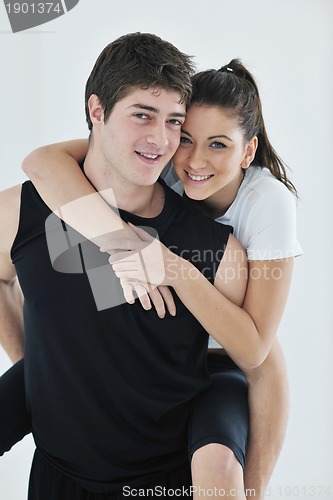 Image of happy young couple fitness workout and fun