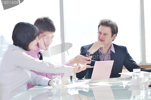 Image of group of business people at meeting