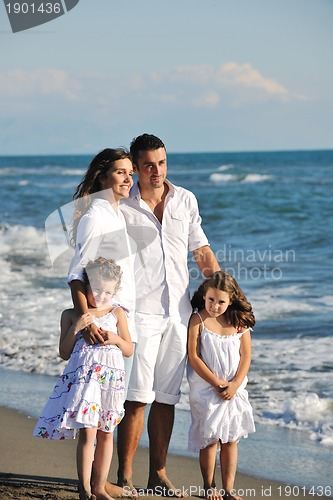 Image of happy young  family have fun on beach
