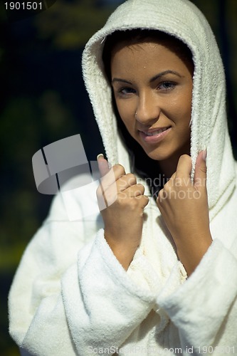 Image of Young woman take a steam bath