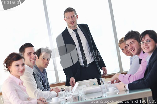 Image of group of business people at meeting