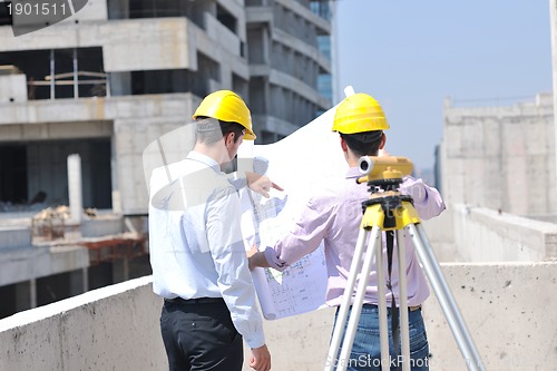 Image of Team of architects on construciton site