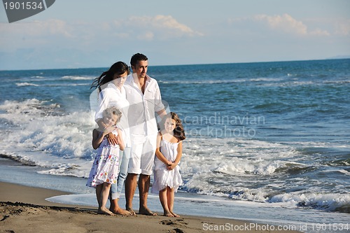 Image of happy young  family have fun on beach