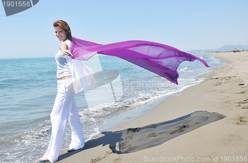 Image of young woman relax  on beach