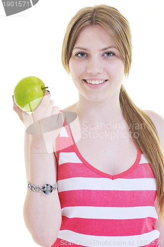 Image of happy  young  woman eat green apple isolated  on white