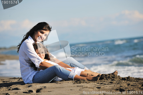 Image of mom and daughter portrait on beach