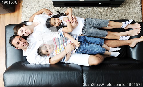 Image of young family at home