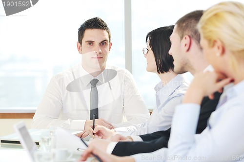 Image of group of business people at meeting