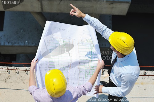 Image of Team of architects on construciton site