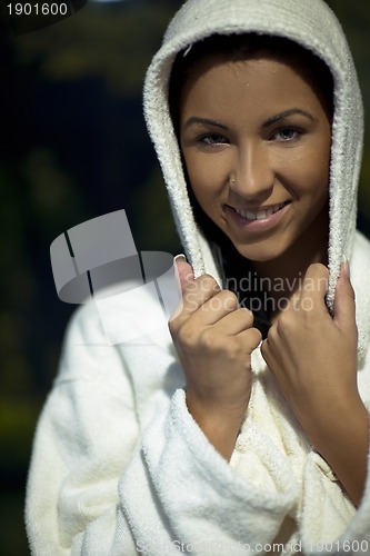 Image of Young woman take a steam bath