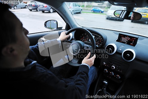 Image of man using car navigation