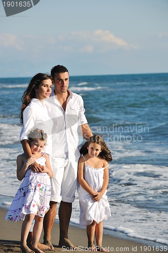 Image of happy young  family have fun on beach