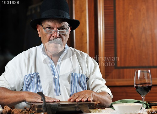 Image of man making luxury handmade cuban cigare