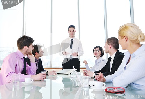 Image of group of business people at meeting