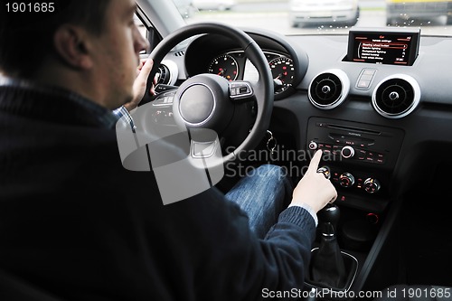 Image of man using car navigation