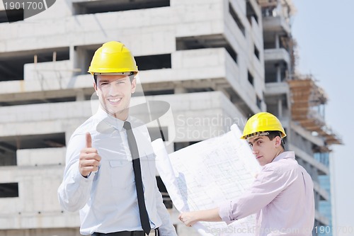 Image of Team of architects on construciton site