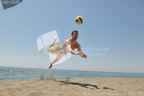 Image of male beach volleyball game player