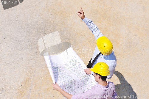 Image of Team of architects on construciton site