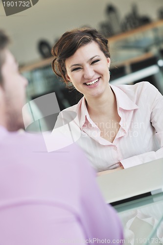 Image of young business woman on meeting