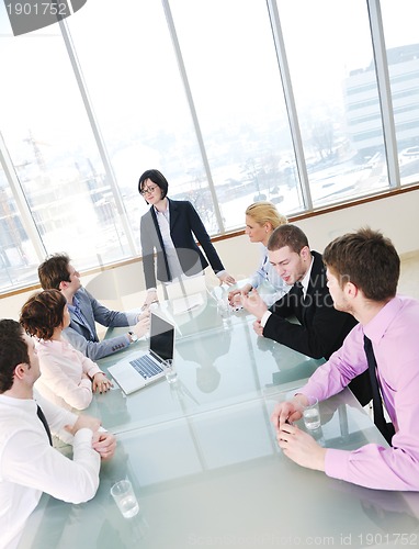 Image of group of business people at meeting