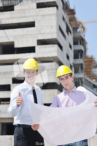 Image of Team of architects on construciton site