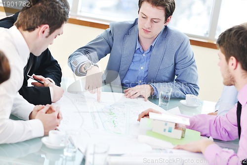 Image of group of business people at meeting