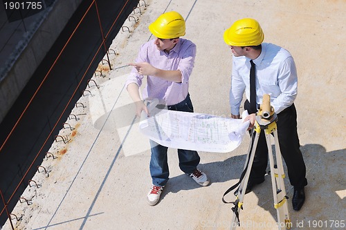 Image of Team of architects on construciton site