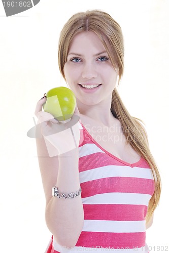 Image of happy  young  woman eat green apple isolated  on white