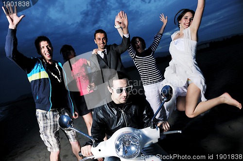 Image of happy young  people group have fun on beach