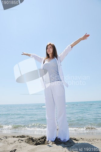 Image of young woman relax  on beach